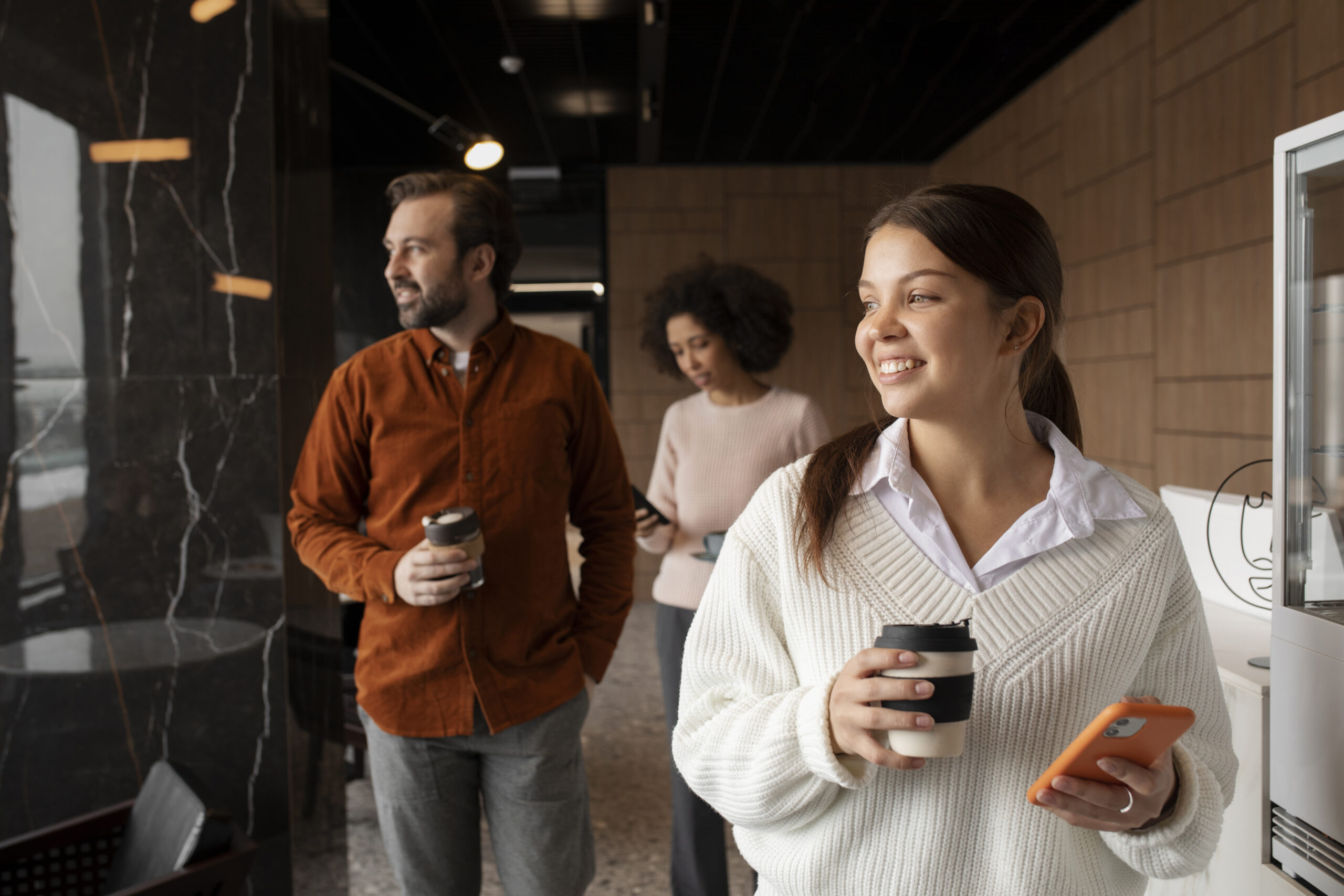 smiley-colleagues-chatting-work-medium-shot